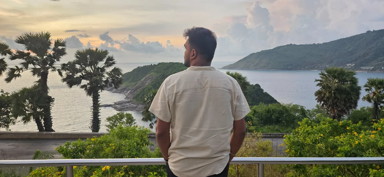 Looking out over a tropical coastline at sunset