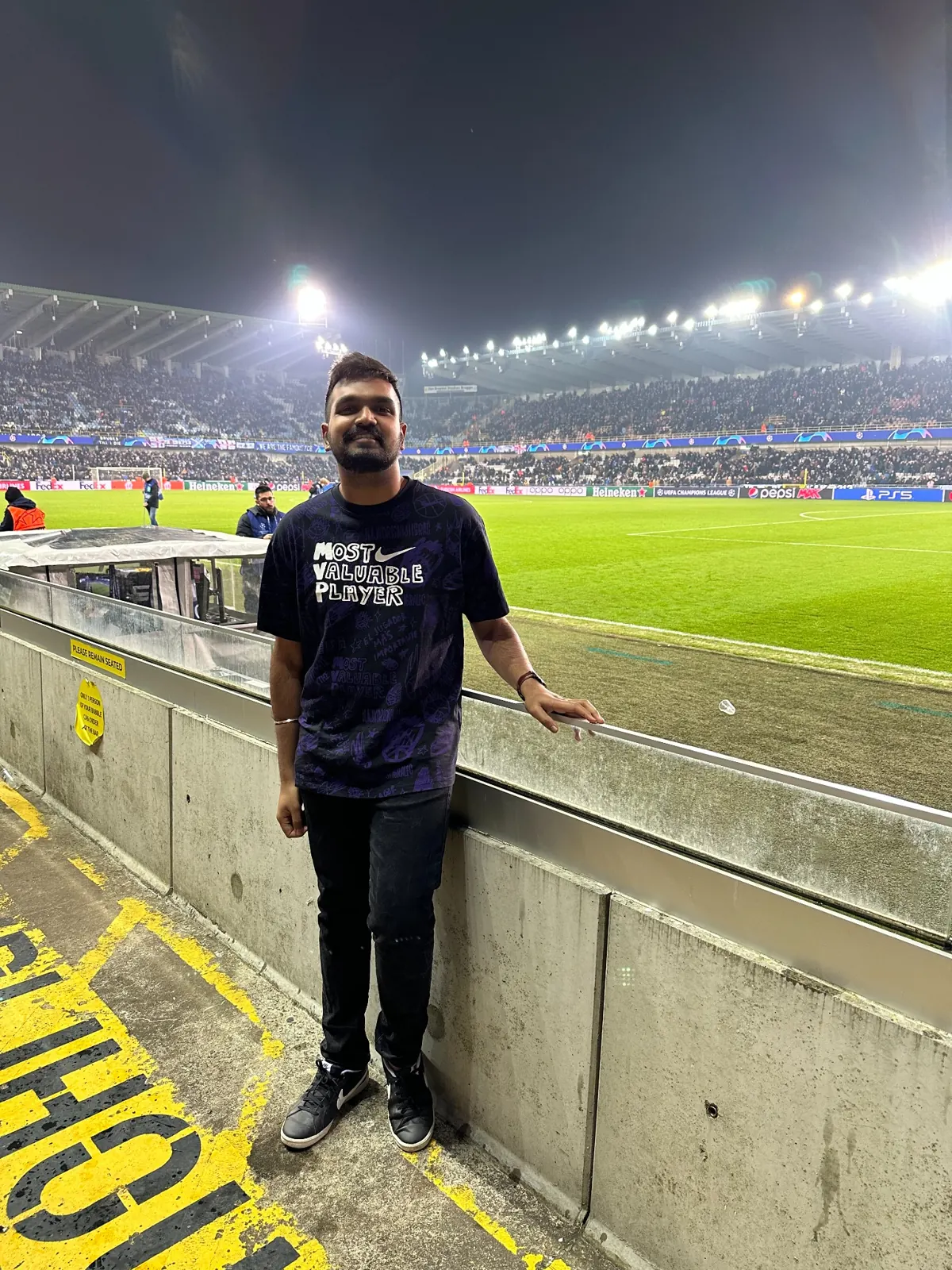 Watching a Champions League football match from pitchside