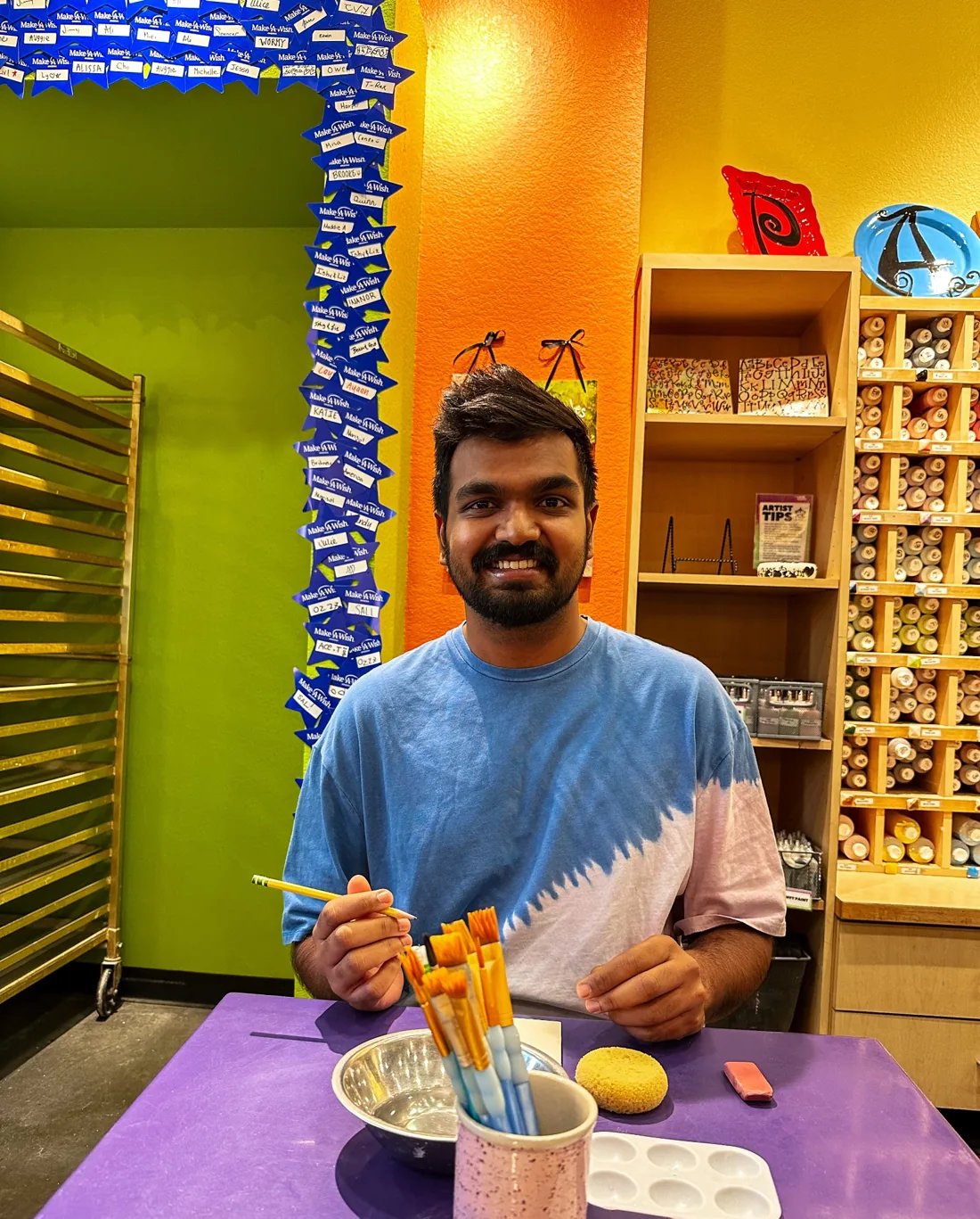 Painting at a colorful art studio